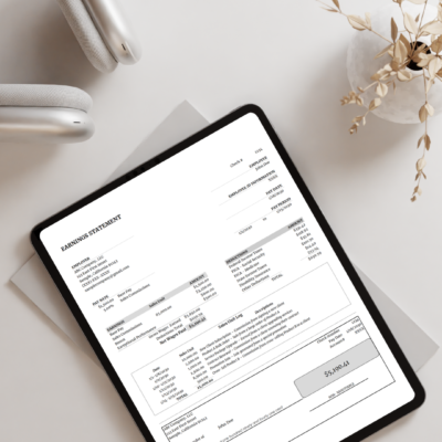 A tablet on a table showing the sales commission earnings statement.