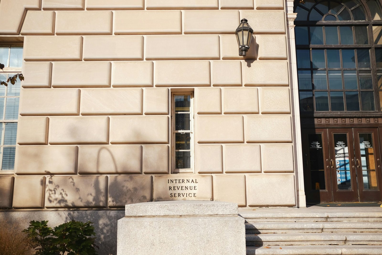 The entrance of the Internal Revenue Service building, with its name carved in stone.